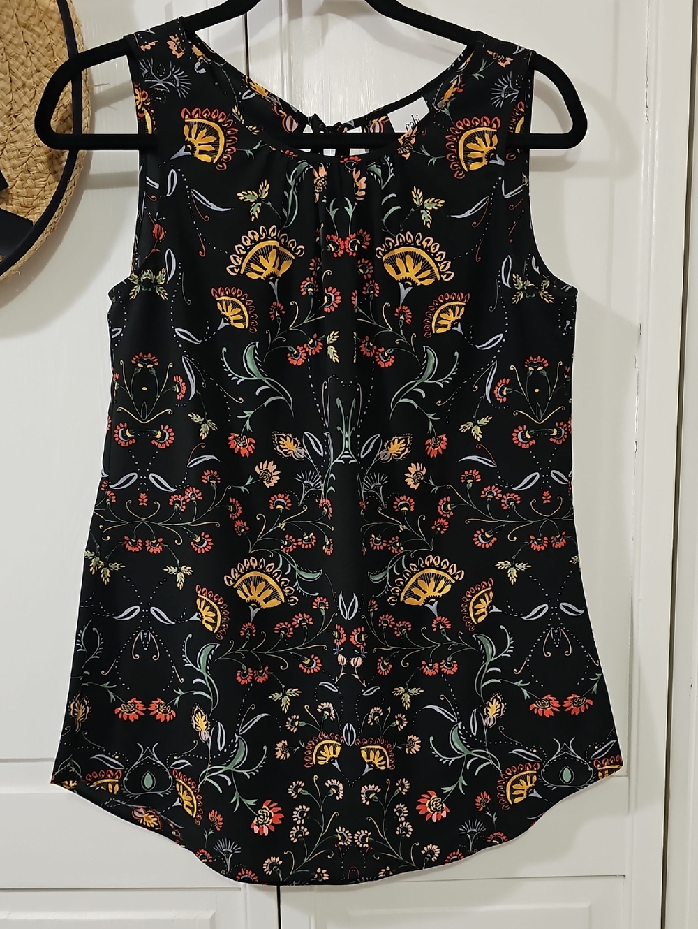 CAbi Black Sleeveless Floral Top with Yellow and Coral Blooms
